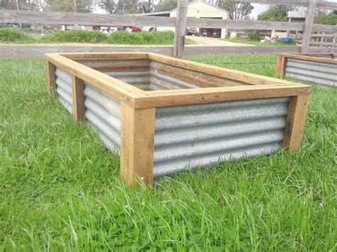 homemade recycled wood raised bed garden | Raised garden beds, Recycled ...