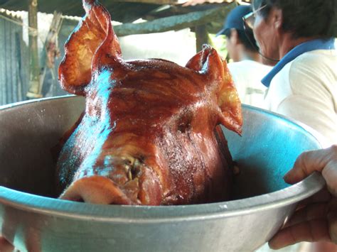 Lechon, Roasted pig | The head is then separated and given t… | Flickr