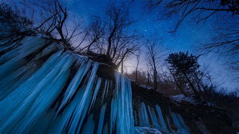 Frozen waterfall icicles at night with stars, Matsumoto, Nagano, Japan | Windows Spotlight Images