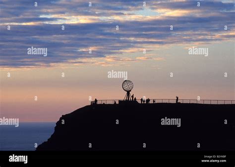 Norway Nordkapp midnight sun The Globe and sea Stock Photo - Alamy