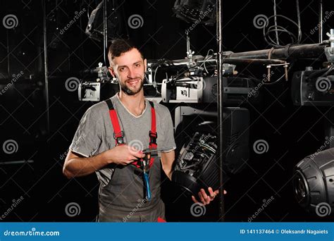 The Lighting Engineer Adjusts the Lights on the Stage. Stock Photo - Image of chroma, electrical ...