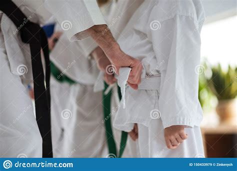 Helpful Aikido Trainer Tying Belt for His Student Stock Image - Image ...