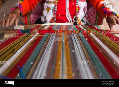 Peruvian woman with alpaca wool Stock Photo - Alamy