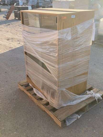 Two sliding glass trophy cases. - Sierra Auction Management Inc