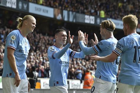 Early Grealish, Haaland goals ease Man City to win at 10-man Wolves ...