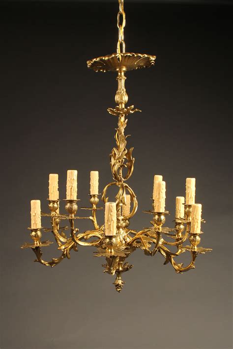 Antique French cast bronze chandelier with 12 arms.