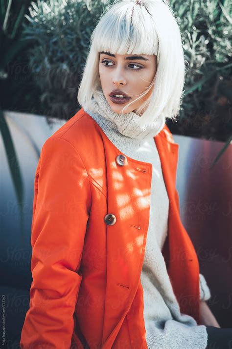 "Young Beautiful Woman With White Hair Outdoors" by Stocksy Contributor "Maja Topcagic" - Stocksy