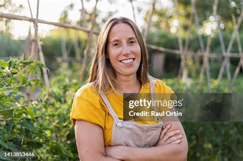 Portrait Of Smiling Female Farmer High-Res Stock Photo - Getty Images