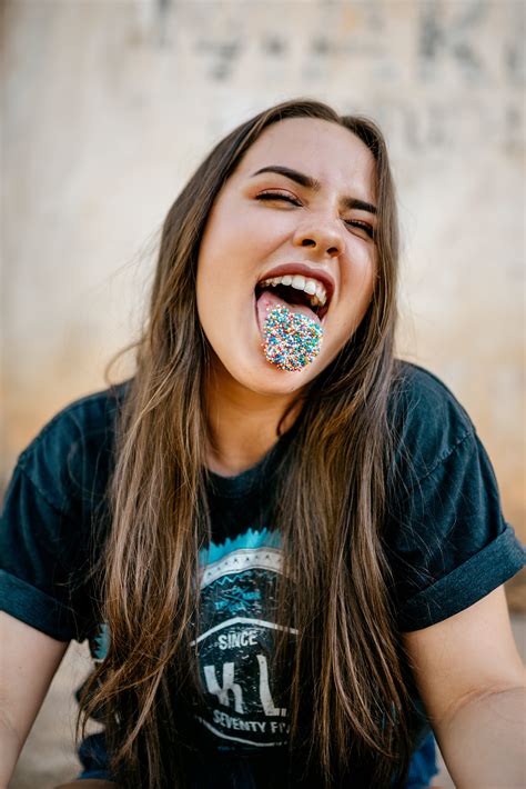 Woman With Candies on Tongue · Free Stock Photo