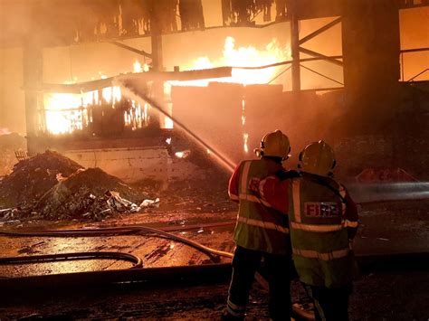 Waste fire still burning in derelict Rotherham building - letsrecycle.com