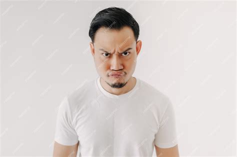 Premium Photo | Grumpy face man in white tshirt isolated on white ...