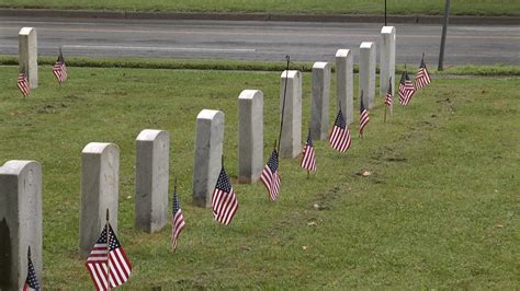 Cadets place flags on graves of military members - WNKY News 40 Television