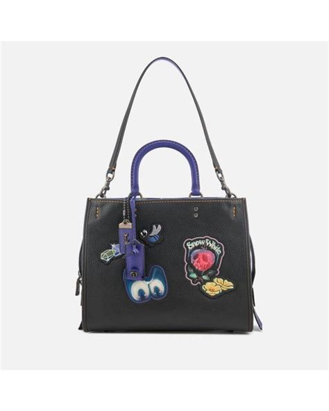 COACH Disney X Coach Dark Fairytale Patches Rogue Bag | Lyst