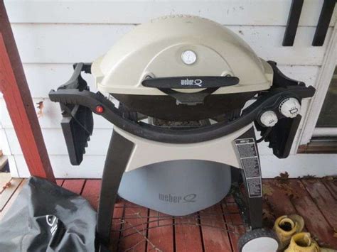 Weber 2 Burner Gas Grill - Lambrecht Auction, Inc.