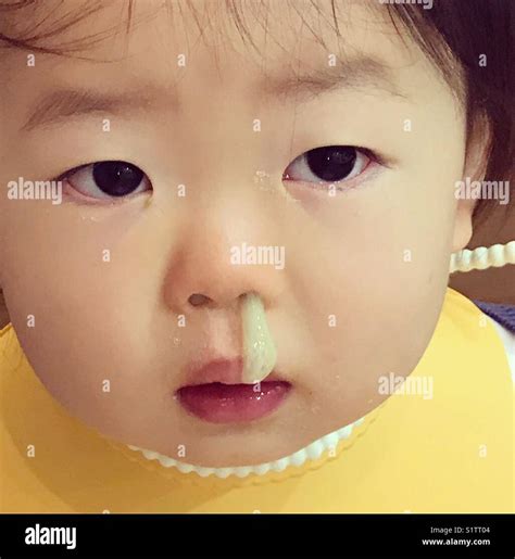 a japanese baby with green snot Stock Photo - Alamy