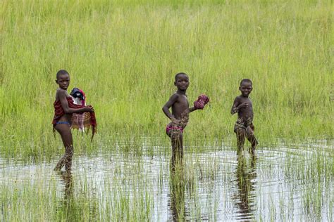 Young boys bathing | Okavango River, Hakusembe, Namibia | rosemary jackson | Flickr