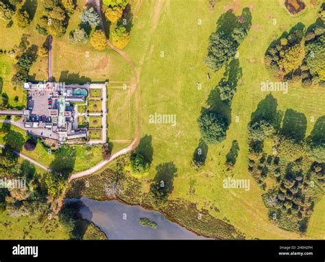 Powderham Castle and Powderham Park from a drone, Powderham, Exeter, Devon, England, Europe ...