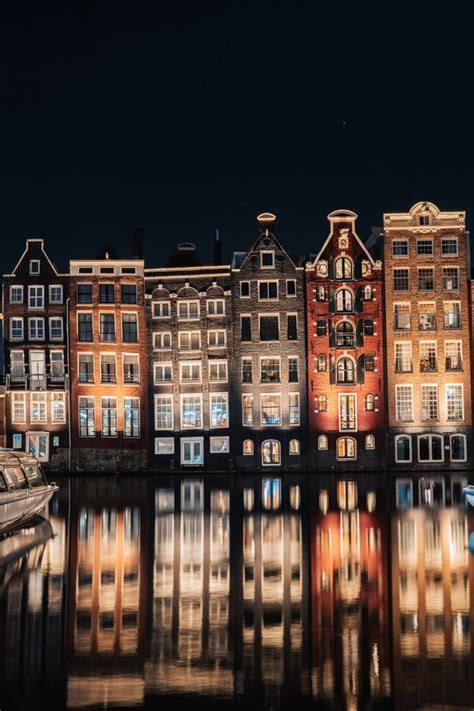 Dancing Houses Damrak Amsterdam during the Night Netherlands Holland Stock Photo - Image of ...