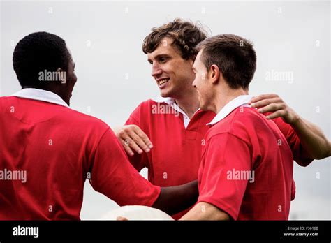 Rugby players celebrating a win Stock Photo - Alamy