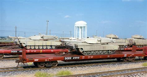 Abrams tanks heading out from Ft Hood on DODX Flat cars | Model Railroad Hobbyist magazine