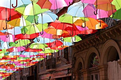 Street Art By ArtFlyMovie: UMBRELLA INSTALLATION in Águeda, Portugal