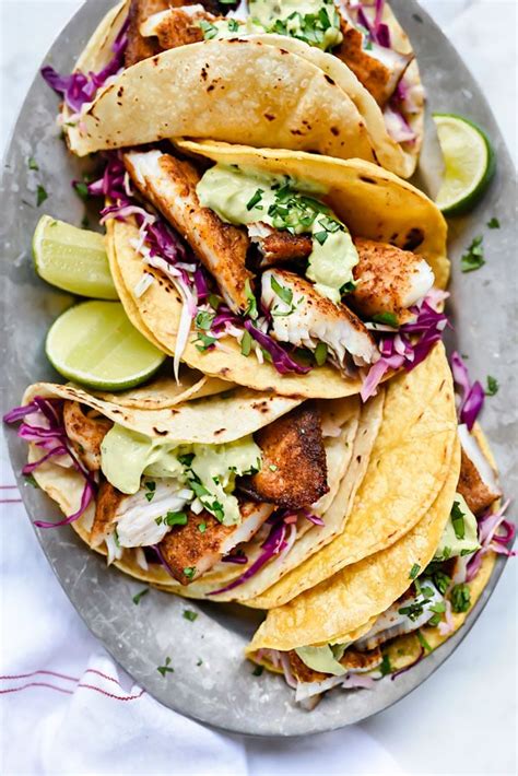 Blackened Fish Tacos with Creamy Avocado Sauce | foodiecrush.com