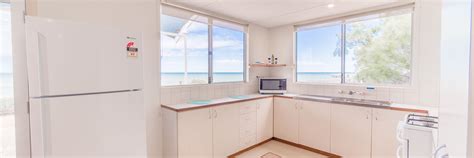 Mackerel-Islands-accommodation-beachfront-cabin-kitchen-1-slider - mackerelislands.com.au