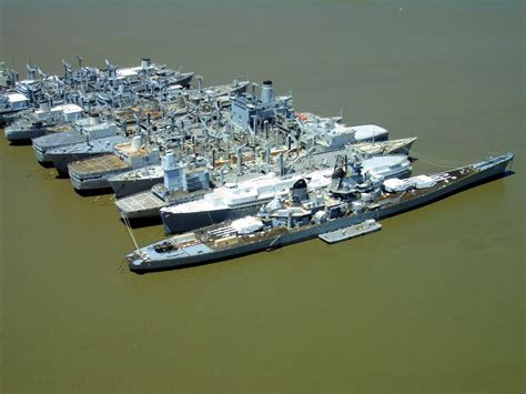 an aerial view of several boats in the water near one another and two ...