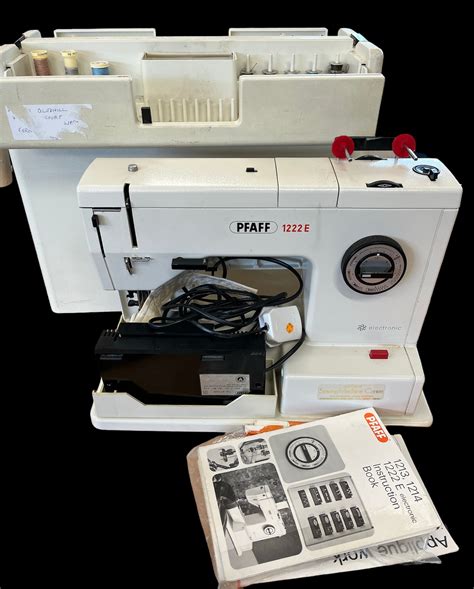 A Pfaff 1222E sewing machine with instructions, acessories and booklets. TRADE - SPARES OR REPAIRS.