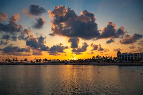 Premium Photo | Colorful sunset above a beach in salalah oman