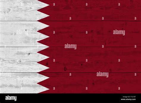 Qatar flag painted on old wood plank. Patriotic background. National flag of Qatar Stock Photo ...