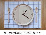 Free Image of Alarm clock on a wooden table | Freebie.Photography