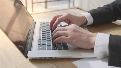 Business People Typing On Their Laptops On Their Desk Stock Footage Video 3870164 | Shutterstock