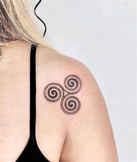 A Guide to Celtic Triskelion Tattoo Symbolism