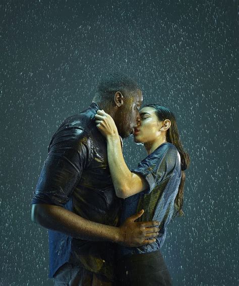 Mixed race couple kissing in the rain | Mixed race couple, Kissing in the rain, Kissing couples