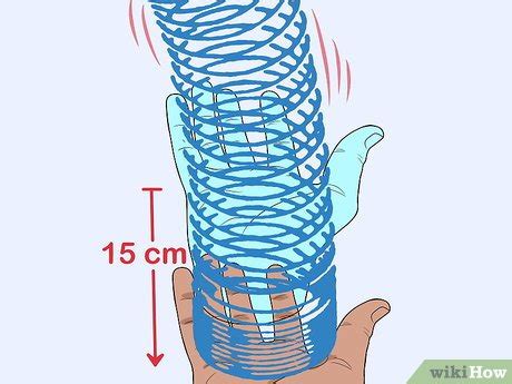 How to Do Cool Tricks With a Slinky (with Pictures) - wikiHow