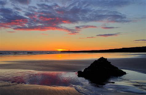 Sunset at Porthcawl Photograph by Pete Hemington - Fine Art America