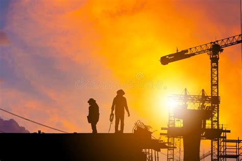 Silhouette of Worker on Building Construction Site at Sunset in Evening Time Stock Image - Image ...