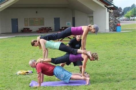 4-Person Yoga Poses: How to Quadruple Your Acro Yoga Experience, for Beginners - The Yoga Nomads