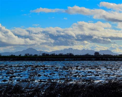 Sutter Buttes Sunrise stock image. Image of backlit, central - 26712311