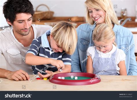 Family Playing A Dice Game Stock Photo 91139627 : Shutterstock