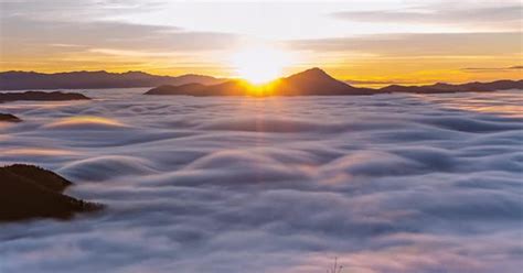 Waves of Foggy Clouds at Sunrise in Misty Mountains Nature, Stock Video - Envato Elements