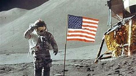 Neil Armstrong On The Moon Holding Flag