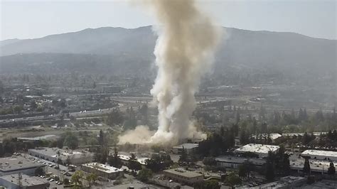 Raging structure fire in South Bay emits massive smoke plume