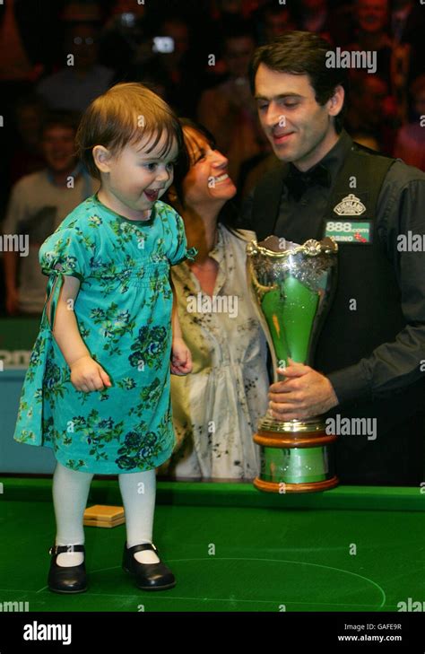 Ronnie O'Sullivan's daughter Lily plays on the table after her father's ...