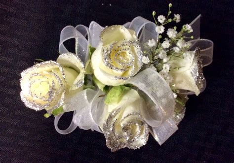 White roses wrist corsage | Wrist corsage, Flowers in hair, Corsage