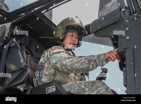 First Lt. Sarah Jeon, an AH-64 Apache helicopter pilot from the 4th ...