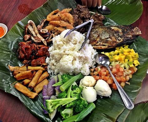 kamayan, or eating with your hands, is one thing that is truly Filipino ...