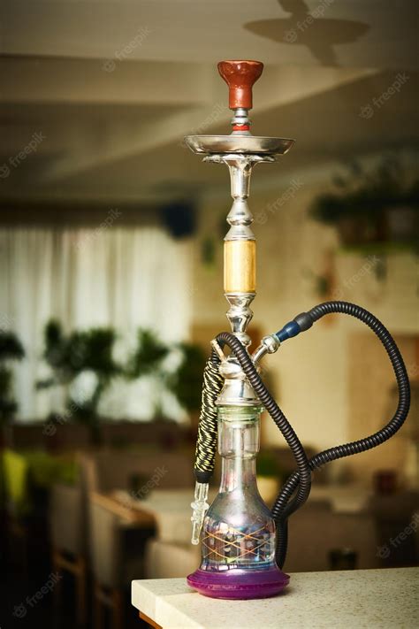 Premium Photo | Wood hookah on table in hookah lounge Shallow dof