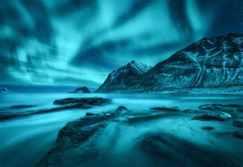 Blue northern lights with mountains - Wallpaper
